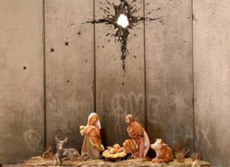 Banksy instala en Belén un provocador pesebre con muro y agujero de proyectil
