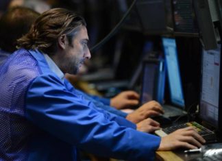 Wall Street vuelve a apuntarse un récord en una sesión de escasos cambios