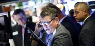 Wall Street abre con caídas en medio de la volatilidad por el coronavirus