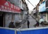 China eleva a 2.592 los muertos por COVID-19 entre los 77.150 infectados