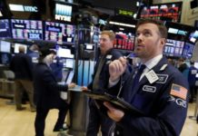 Wall Street cierra en verde y vuelve a esquivar el miedo al coronavirus