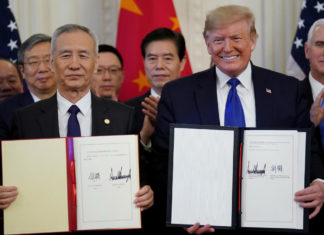 La «primera fase» del pacto comercial EEUU-China comienza con dudas por virus