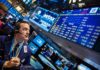 Wall Street abre en rojo y Dow se desploma casi 1.000 puntos por coronavirus