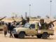 Libia anuncia primera muerte por COVID-19 en medio de intensos combates