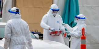 Casos de COVID-19 pasan de 115.000 a 312.000 en una semana nefasta en América