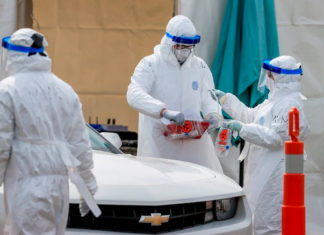 Casos de COVID-19 pasan de 115.000 a 312.000 en una semana nefasta en América
