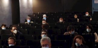 AMC, la mayor cadena de cines de EE.UU., rectifica y exigirá mascarillas