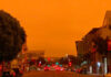 El humo y la niebla cubren San Francisco de un cielo naranja apocalíptico