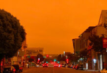 El humo y la niebla cubren San Francisco de un cielo naranja apocalíptico