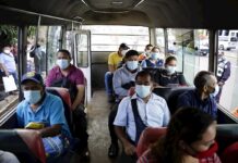 El Salvador exigirá prueba de COVID-19 para entrar al país, según medios bus de transporte público