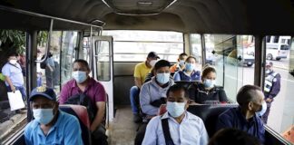 El Salvador exigirá prueba de COVID-19 para entrar al país, según medios bus de transporte público