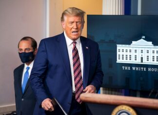 Trump busca politizar la vacuna de covid en medio de récord diario de casos