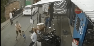 ¡Con un bebé en brazos! Comerciante se agarra a tiros con asaltantes en Comayagua