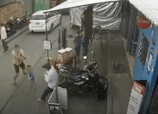 ¡Con un bebé en brazos! Comerciante se agarra a tiros con asaltantes en Comayagua