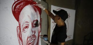 Artista colombiano pinta con sangre humana mural de Residente