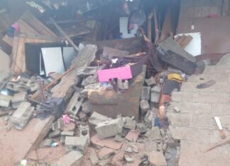 Mueren dos niños al caer muro sobre su vivienda producto de las lluvias, en Villanueva, Cortés