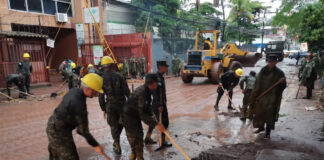 Más de una veintena de barrios afectados por lluvias que seguirán este domingo en el país