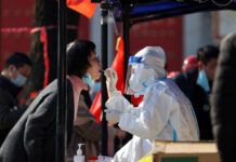 China da por «básicamente terminada» la ola de covid-19