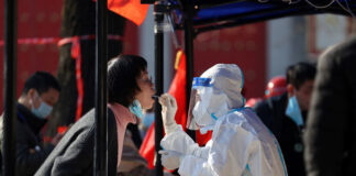 China da por «básicamente terminada» la ola de covid-19
