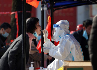 China da por «básicamente terminada» la ola de covid-19