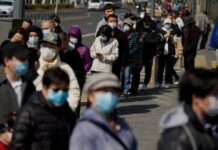 China pide a la OMS que «no politice» la investigación del origen de la COVID