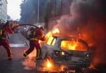 Al menos 96 detenidos y 255 coches quemados en la noche de la fiesta nacional francesa