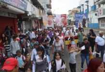 Migrantes realizan procesión en sur de México para pedir que se regule su tránsito a EE. UU.