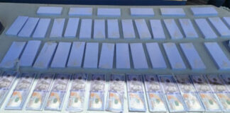 Agentes policiales hallan 210 mil dólares falsos y 35 paquetes de papel moneda en una caja fuerte en Danlí, El Paraíso