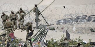 Autoridades disuelven campamento de migrantes en la frontera de México con EE. UU.