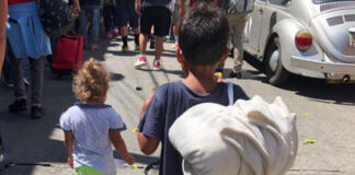Más de 2,300 menores migrantes hondureños no acompañados siguen en centros de detenciones