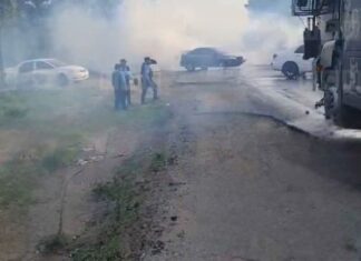 Batalla campal en El Progreso: Policía desaloja con gas lacrimógeno bloqueo de taxistas